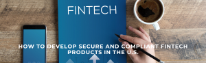 Top view of a desk with a smartphone, tablet showing the word FINTECH, a coffee cup, and a hand holding a pen.